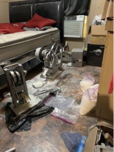 A pill press found during a JCODE operation in Louisiana in 2020 illustrates the dirty conditions of some operations.