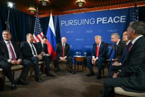 US President Donald Trump (C-R) and Russian President Vladimir Putin (C-L) meet during a US-Russia summit on Ukraine at Joint Base Elmendorf-Richardson in Anchorage, Alaska, on August 15, 2025. (Photo by ANDREW CABALLERO-REYNOLDS / AFP)